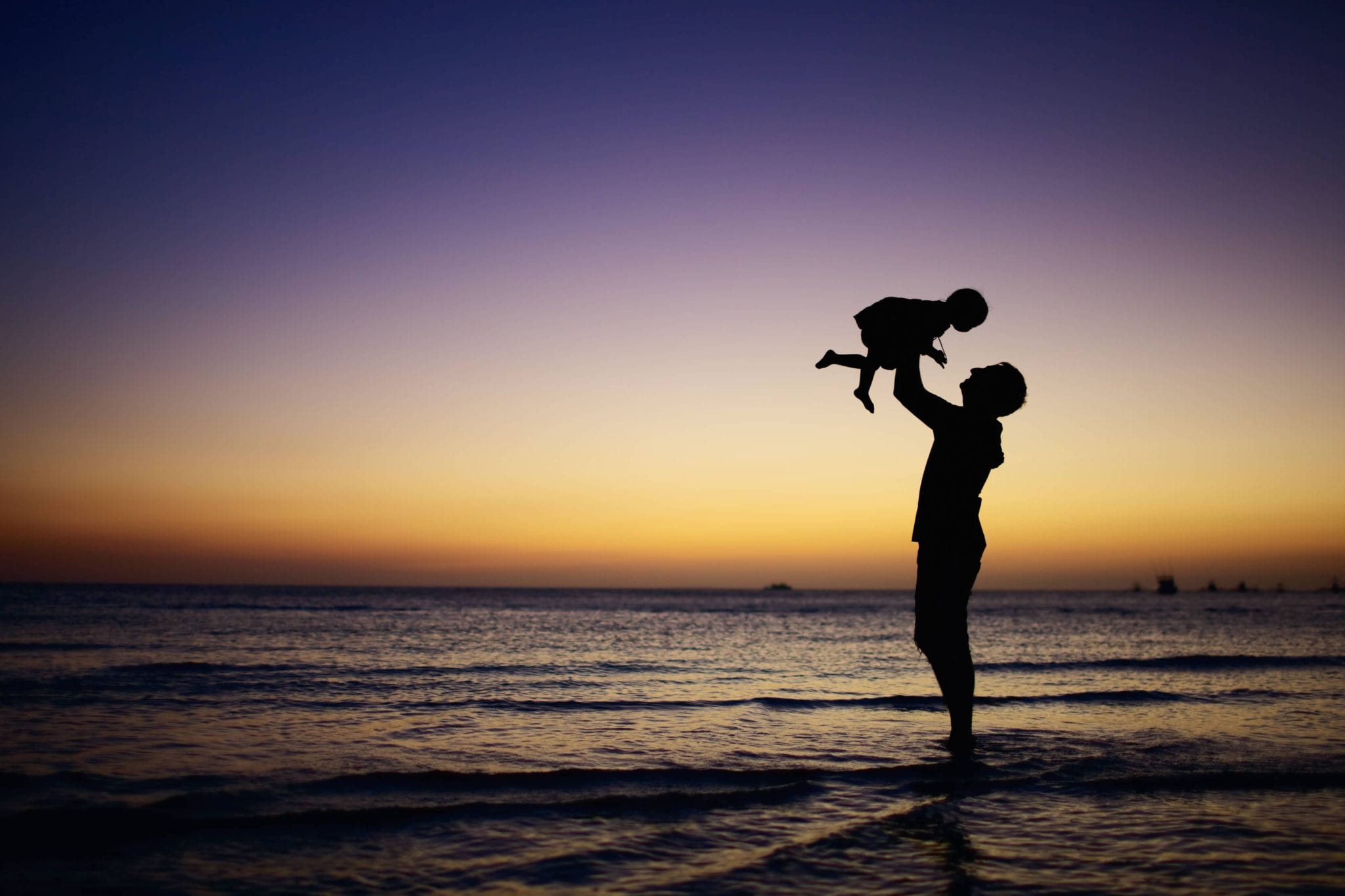 Beach silhouette adult baby in arms jpg Institute Of Photography